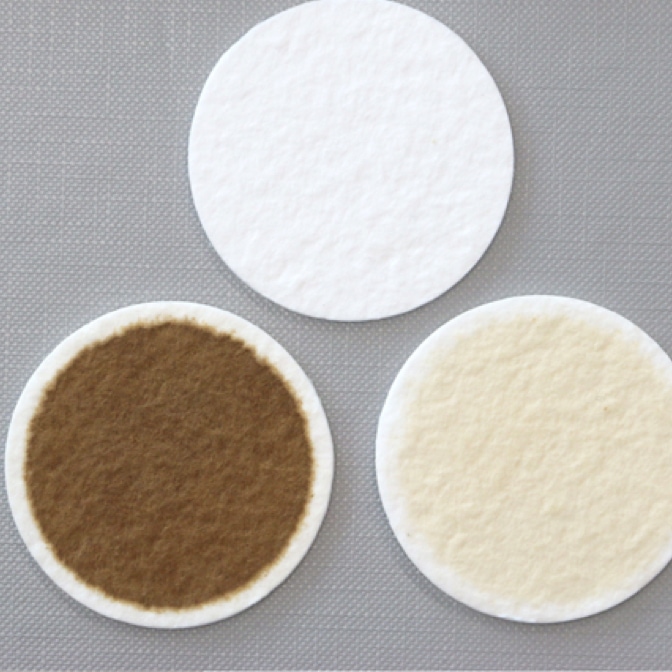 Representation of three filters, one pristine and the two others contaminated