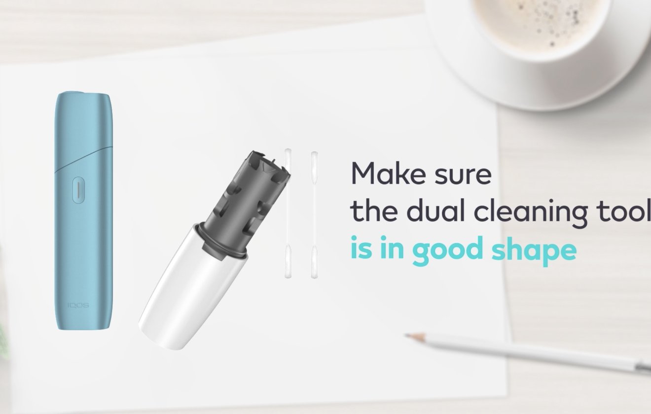 IQOS Originals One y herramienta de limpieza.